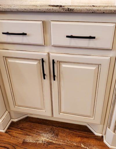 Oil Rubbed Bronze Subtle Arch Handles on Cream Lower Kitchen Drawers