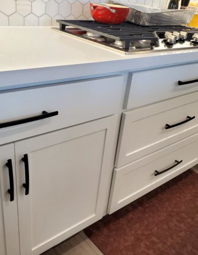 Flat Black Subtle Arch Handles on White Shaker Kitchen