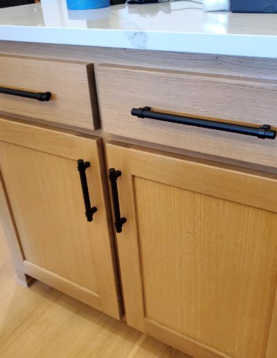 Flat Black Euro Style Handles on Wood Kitchen Drawers