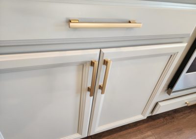 Brushed Brass Gold Contemporary Handles on Off White Drawer