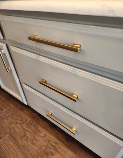 Gold Contemporary Handles on Off White Drawer